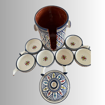 Handmade Safi blue ceramic serving set featuring floral mezze and condiment bowls.